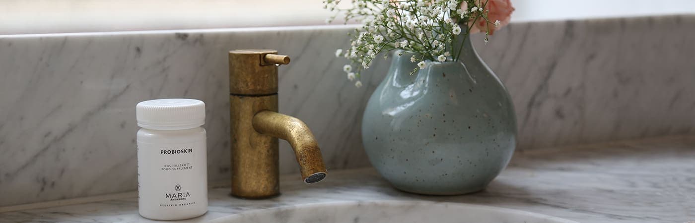 Person being massaged with hot rocks